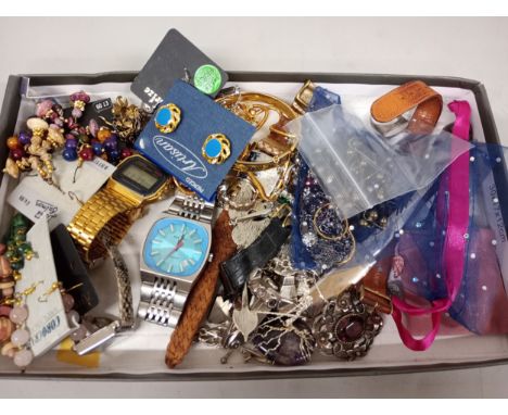 A box of costume jewellery includes a silver ring, and six wristwatches including gold-tone Casio digital