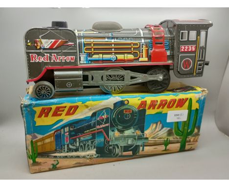 A tin-plate model Friction Powered 'Red Arrow' locomotive, in original box, made in Japan