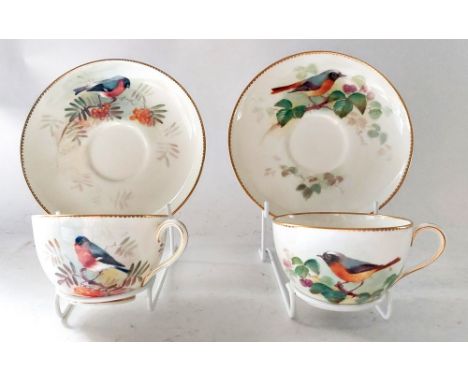 A group of Ornithological themed Royal Worcester cups and saucers.  A Bullfinch cup and saucer, each piece signed by W Powell