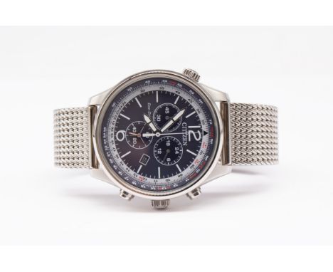 Citizen Eco-Drive H500-5055148 watch with stainless steel mesh watch bracelet boxed.  The watch face is round and navy blue i