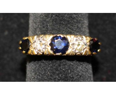 Vintage 18ct Yellow Gold Sapphire and round brilliant cut Diamond Five Stone Ring. Contains three inky blue sapphires.  Centr