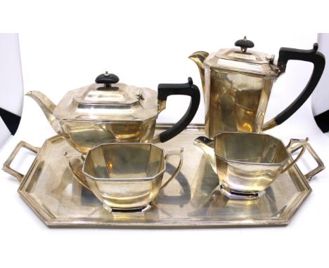 Four Piece Sterling Silver Tea Set and Tray. The Tea Set includes a Sterling Silver Tea Pot, Coffee Pot, Milk Jug and Sugar B