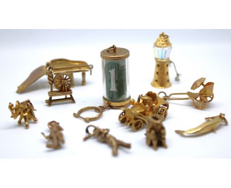 9ct Gold and Unmarked Yellow Metal Charms x 12.  To include seven 9ct Gold hallmarked charms; Car, Horse stirrups, Cart, Elep