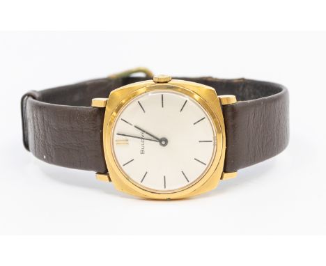 Vintage Gold Plated Bulova mechanical watch with dark brown leather strap.  On the back of the watch case it says ''BULOVA 1 