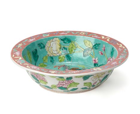 A MODERN PERANAKAN STYLE TURQUOISE GROUND BASIN
Decorated with a phoenix and peonies
34cm diameter
Condition: For a condition