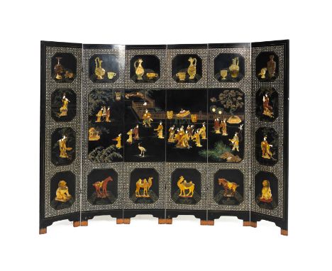 A BLACK LACQUER AND HARDSTONE INSET SIX FOLD SCREEN
Decorated with hardstone figures in garden and processional settings, wit