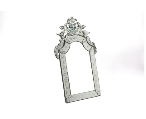 A VENETIAN EASEL BACK DRESSING TABLE MIRROR
With foliate decoration
82cm x 45cm
Condition: For a condition report or further 