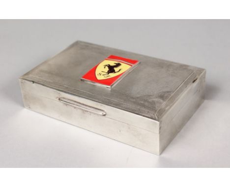 A GOOD ENGINE TURNED SILVER CIGARETTE BOX, the lid with a plaque of a Ferrari.