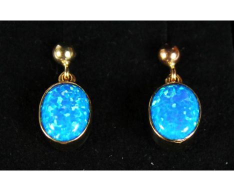 A PAIR OF 9CT GOLD BLACK GILSON OPAL DROP EARRINGS.