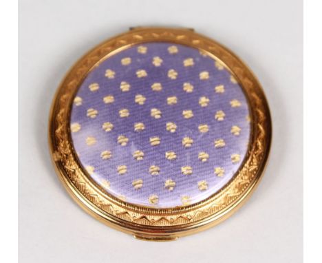 A MAUVE ENAMEL COMPACT.