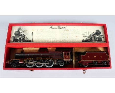 A HORNBY SERIES O GAUGE PRINCESS ELIZABETH 4-6-2 LMS 6201 LOCOMOTIVE and four wheel tender, in a green leatherette box, with 