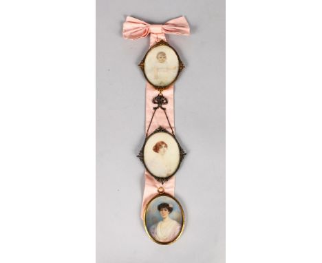 N. BOURNE. Three oval portrait miniatures of a baby, young lady and older lady, in gilt frames.