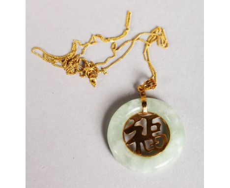 A CHINESE JADE PENDANT on a gold chain.