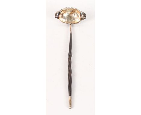 A GEORGE III SILVER TODDY LADLE.