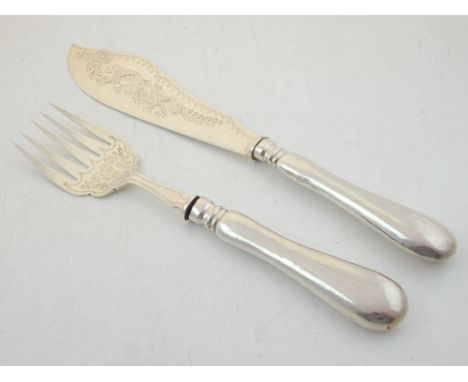 An early 20th century silver fish serving knife and fork set, Birmingham 1905 and 1906, with bright cut decoration, 8.2oz