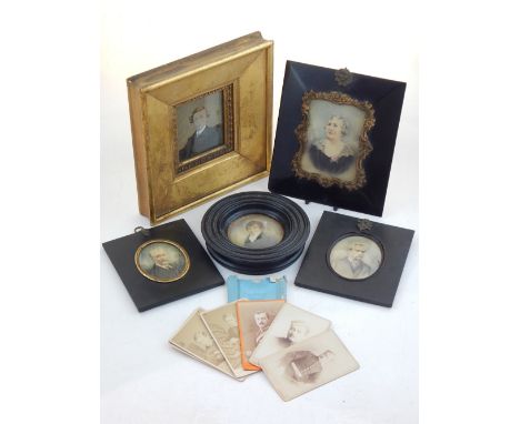 A collection of five printed and painted portrait miniatures and assorted photographic portrait cards.
