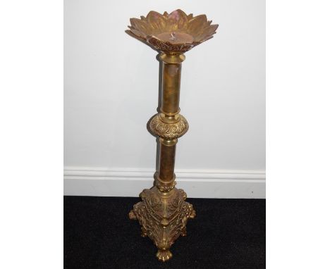 An 18th century style Italian style cast and polished brass pricket candlestick. H. 81cm