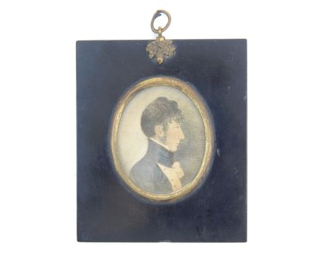 An early 19th century oval portrait miniature of Benjamin Patey, depicted in profile wearing his naval uniform, paper label v