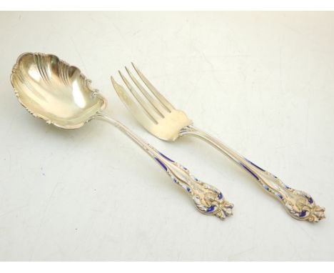A pair of Sterling silver serving fork and spoon, with enamelled and foliate handles. 