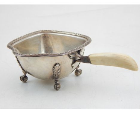 A George VI silver sauceboat, Cooper Bros & Sons, Sheffield 1937, ivory handled of square form on acanthus cast ball and claw