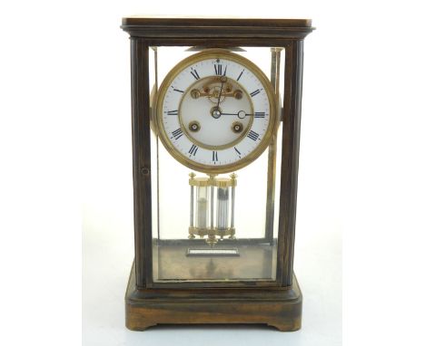 An early 20th century French four glass mantel clock, barrel movement, strikes a bell on half hour, with twin jam-jar mercury