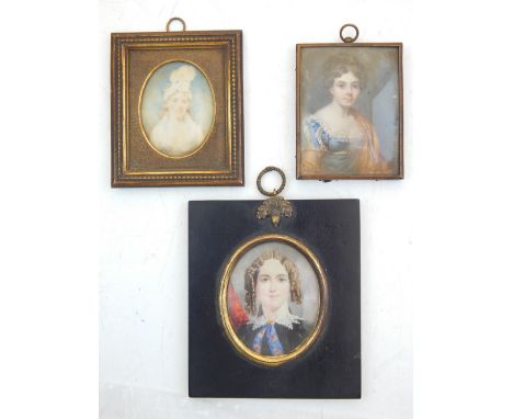 Three late Victorian / Edwardian portrait miniatures of ladies in evening wear, two oval, larger 8cm.
