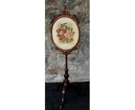 A Victorian pole screen with flower tapestry 143cm tall 