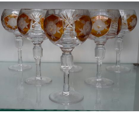 A set of 6 Bohemian crystal cut wine glasses with amber coloured panels