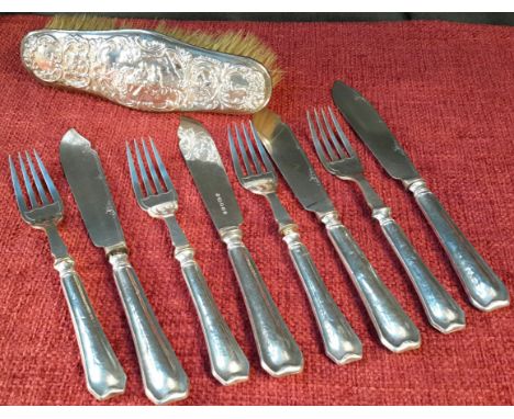 Silver handled fork & knife set, together with ornate silver couple scene brush 