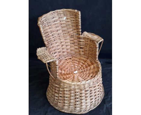 Vintage wicker weaved tub chair 73cm tall.