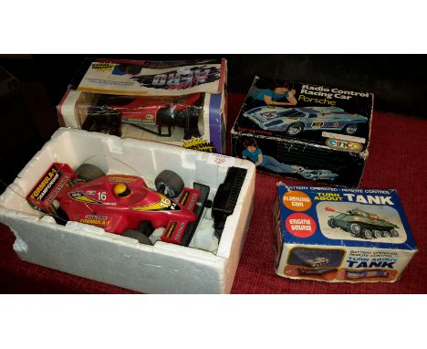 4 vintage remote control cars & tank 