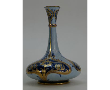 William Moorcroft Macintrye Florian vase decorated with blue & gold flowers on light blue ground, height 16cm.