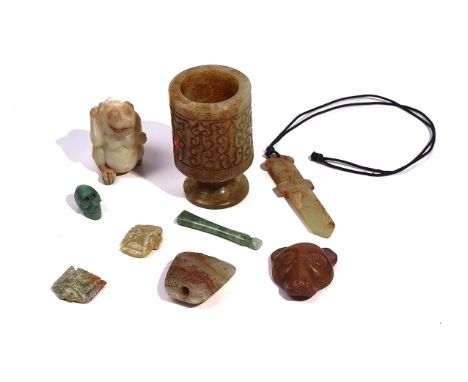 A GROUP OF NINE CHINESE JADESMostly archaistic, various coloursComprising; a cylinder vase, 9.5cm high; dagger pendant, 11cm 