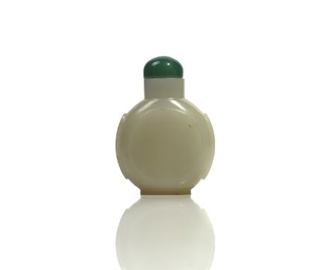 A CHINESE WHITE JADE SNUFF BOTTLEQing dynastyOf flattened circular form, the stone of even tone with some cream inclusions, 5