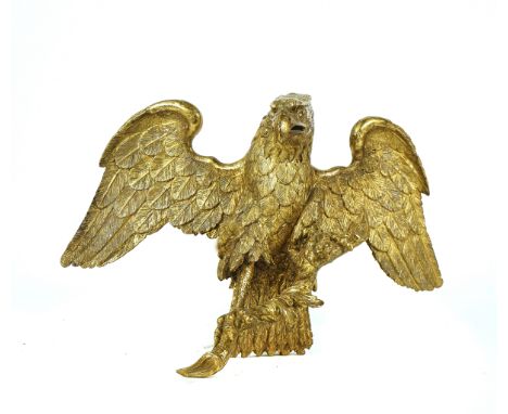 A CARVED GILT-WOOD MODEL OF AN EAGLEEarly 19th CenturyMost likely, previously the surmount of a convex mirror, fitted with a 