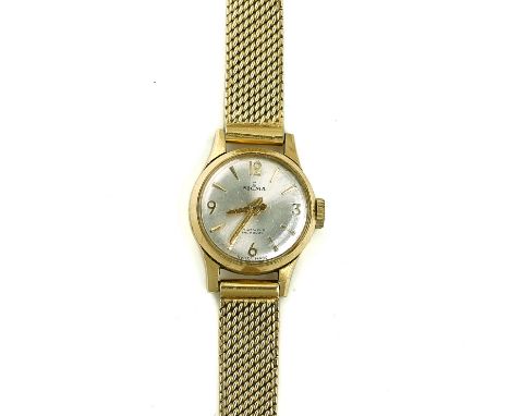A SIGMA GOLD CASED LADY'S BRACELET WRISTWATCHThe signed silvered dial with gilt Arabic and arrow shaped numerals, the casebac