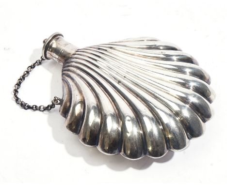 A SILVER SPIRIT FLASKOf scallop shell form, with a screw cap, fitted to a circular link chain, Sheffield 1900, weight 126 gms