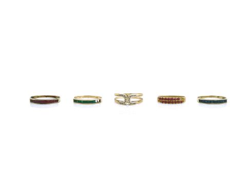 A GOLD AND RUBY RING AND FOUR FURTHER GOLD AND GEM SET RINGS (5)The ruby ring mounted with two rows of circular cut rubies (s