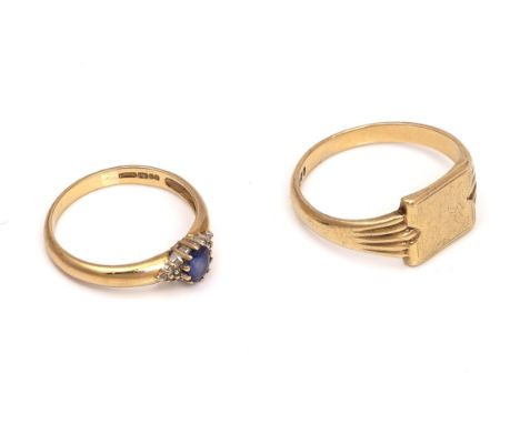 A 9CT GOLD SIGNET RING AND A 9CT GOLD SAPPHIRE AND DIAMOND RING (2)The shaped rectangular signet ring decorated with reeded s