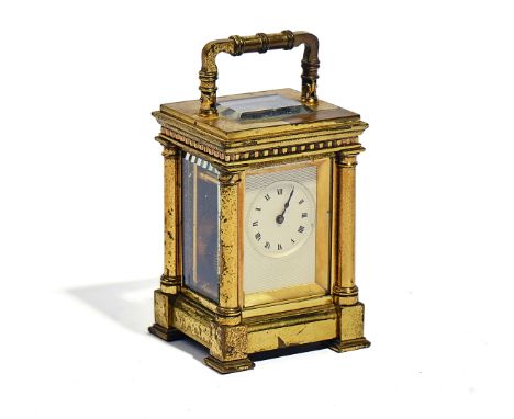 A FRENCH MINIATURE BRASS CARRIAGE TIMEPIECEBy Drocourt, circa 1900The case with three-quarter columns, engine-turned silvered