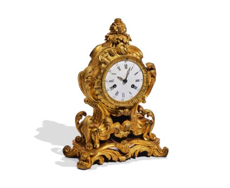 A FRENCH ORMOLU MANTEL CLOCKIn the Louis XV style, Last quarter 19th CenturyThe shaped case cast with foliage, with a 3 1/2in