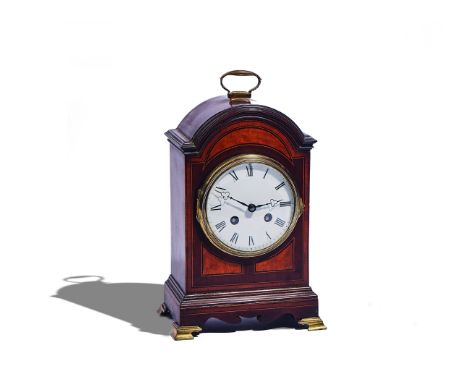 AN EDWARDIAN MAHOGANY, SATINWOOD, OUTLINED AND CHEQUER INLAID MANTEL CLOCKThe arched case with a brass handle above a 4 1/2in