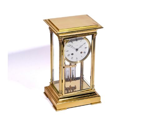 A MODERN FRENCH BRASS FOUR-GLASS MANTEL CLOCKBy L’EpeeIn a polished brass case flanked by three-quarter Corinthian fluted col