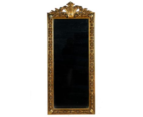 A LATE 19TH CENTURY GILT FRAMED RECTANGULAR MIRRORWith vacant shield crest over acanthus carved frame, 69cm wide; 163cm highC