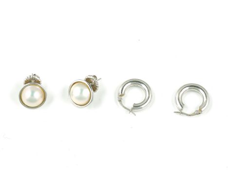 A PAIR OF MABE CULTURED PEARL AND WHITE GOLD EARSTUDS AND A PAIR OF WHITE GOLD EARRINGS (2)The mabe cultured pearl earstuds w
