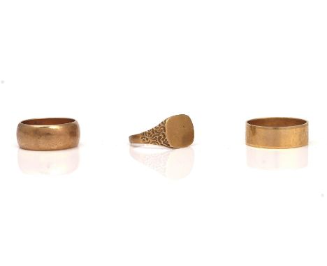 THREE 9CT GOLD RINGS (3)Comprising; a rose gold wedding ring, Birmingham 1963, ring size S and a half, a plain wedding ring, 