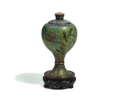 A CHINESE CLOISONNE BALUSTER VASE  AND COVEREarly 20th centuryWorked with flowers against a green ground beneath a blue ruyi 