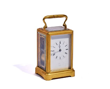 A FRENCH GILT BRASS ONE-PIECE CASE CARRIAGE CLOCKRetailed by Payne &amp; Co New Bond Street London, No 765, circa 1860With si