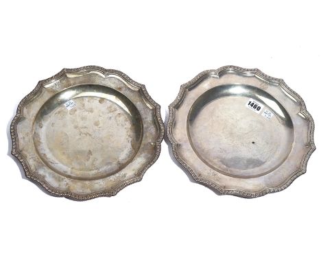 A PAIR OF LATE GEORGE II SILVER MAIN COURSE PLATES (2)Each of shaped circular form, decorated with a gadrooned rim, otherwise