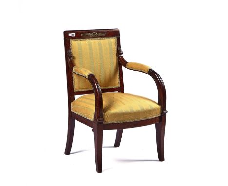 A FRENCH LATE EMPIRE GILTMETAL-MOUNTED MAHOGANY OPEN ARMCHAIROn gently outswept tapering supports, 62cm wide; 61cm deep; 90cm